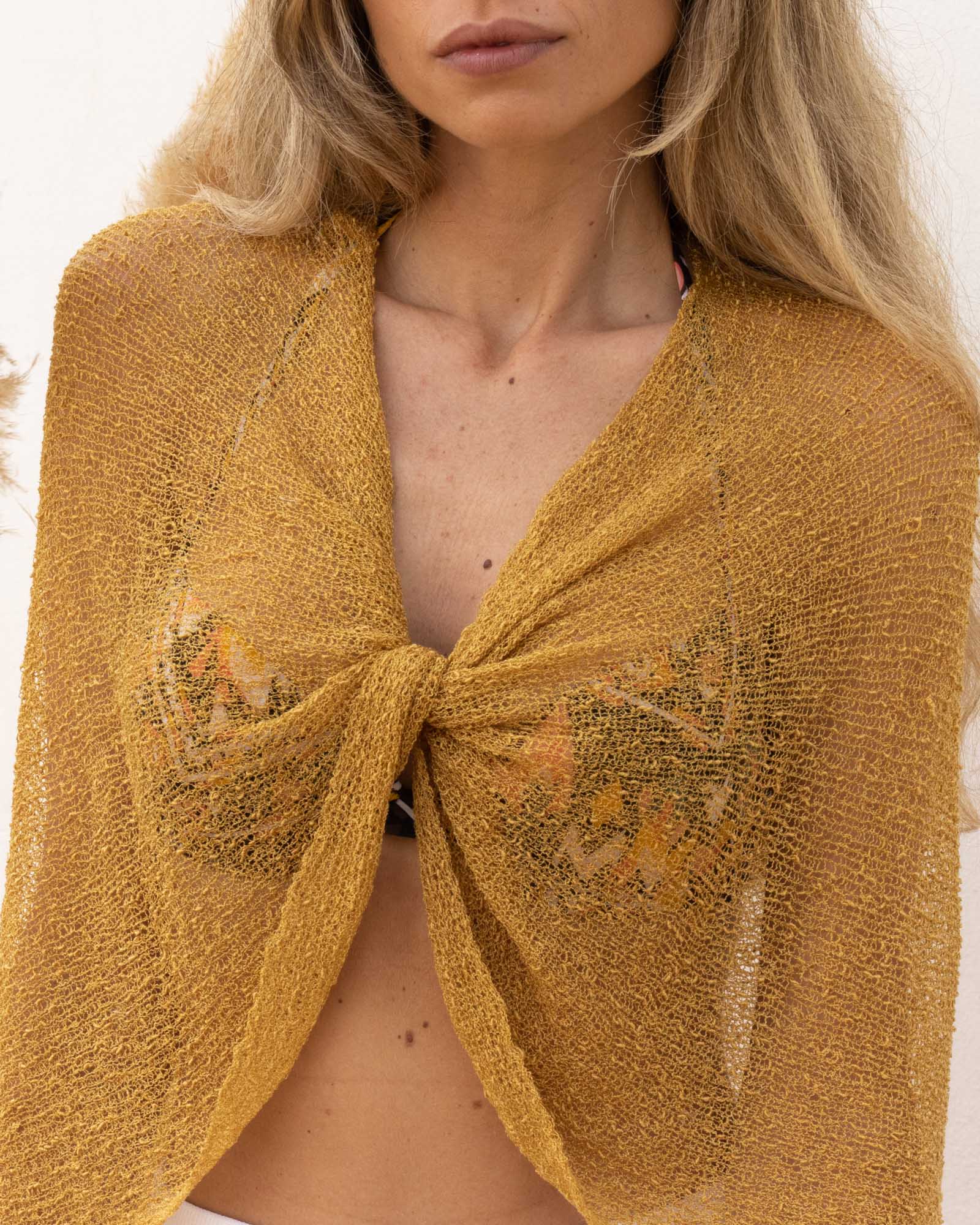 Ponchito versátil dorado