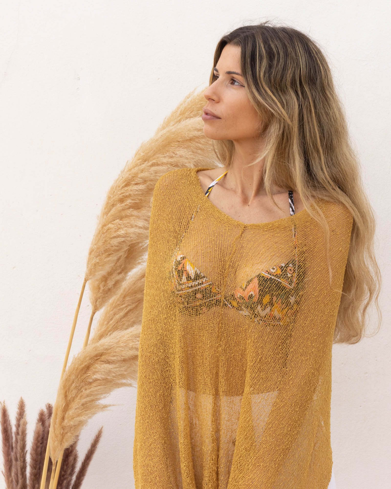 Ponchito versátil dorado